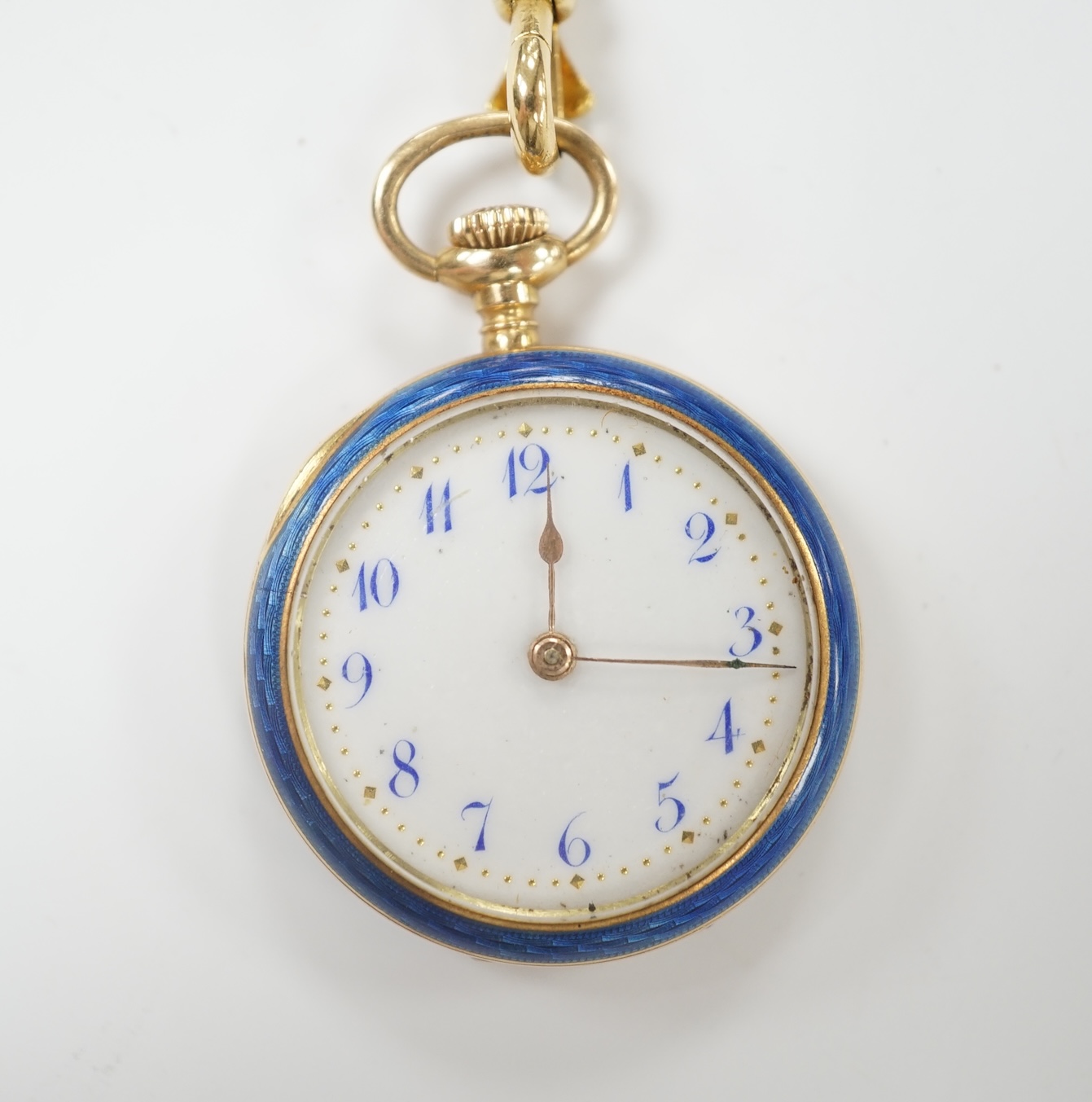 An early 20th century continental 15ct gold and enamel open face fob watch, on an 18ct and two colour enamel chain, 64cm, gross weight 26.5 grams (enamel a.f.).